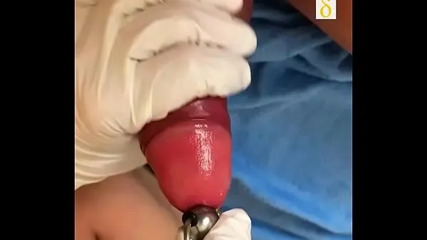 My wife Pia Inserting an Urethra Chain into my bladder Part01 harika Tube'u izleyin