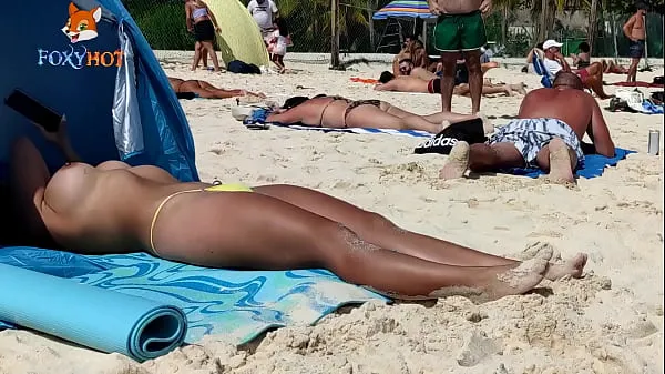 Watch Sunbathing topless on the beach to be watched by other men cool Tube